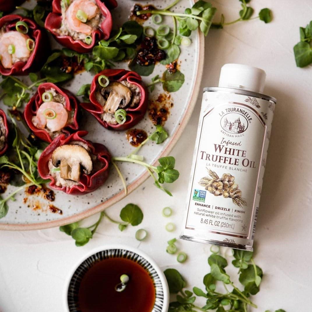 image:imageLa Tourangelle White Truffle Oil amp Black Truffle Oil Set Complex Gourmet Earthy Flavor for Drizzling over Pasta Popcorn Vegetables Potatoes Soup and More Gift Box 845 Fl Oz Each Set of 2GarlicWhite TruffleBasil Gift Box